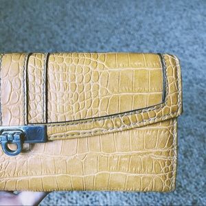 Target mustard faux leather clutch